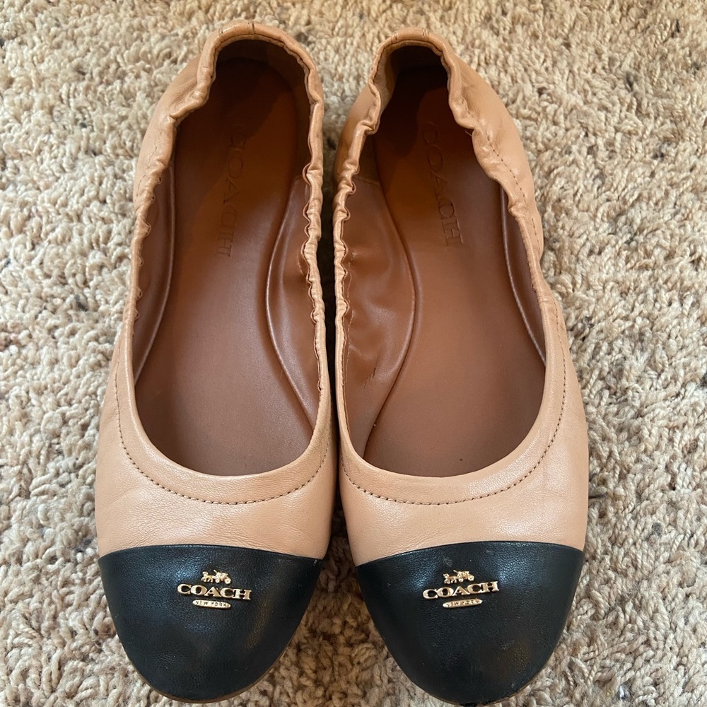 Authentic coach beige-black cap toe flats. In great condition!